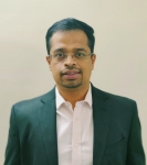 Dr. Mohan B
